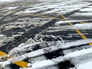 Confusion in Parking Lots after Snow Covers Lines Where Cars Go Everywhere
