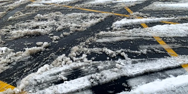 Confusion in Parking Lots after Snow Covers Lines Where Cars Go Everywhere