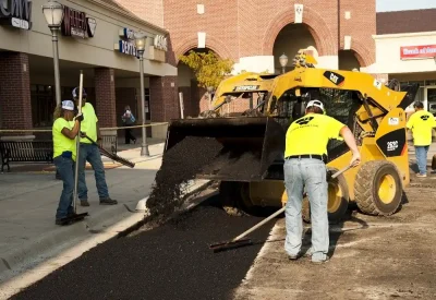 Kansas Asphalt contractors performing parking lot repair