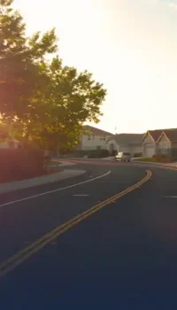 residential road at sunset residential road at sunset